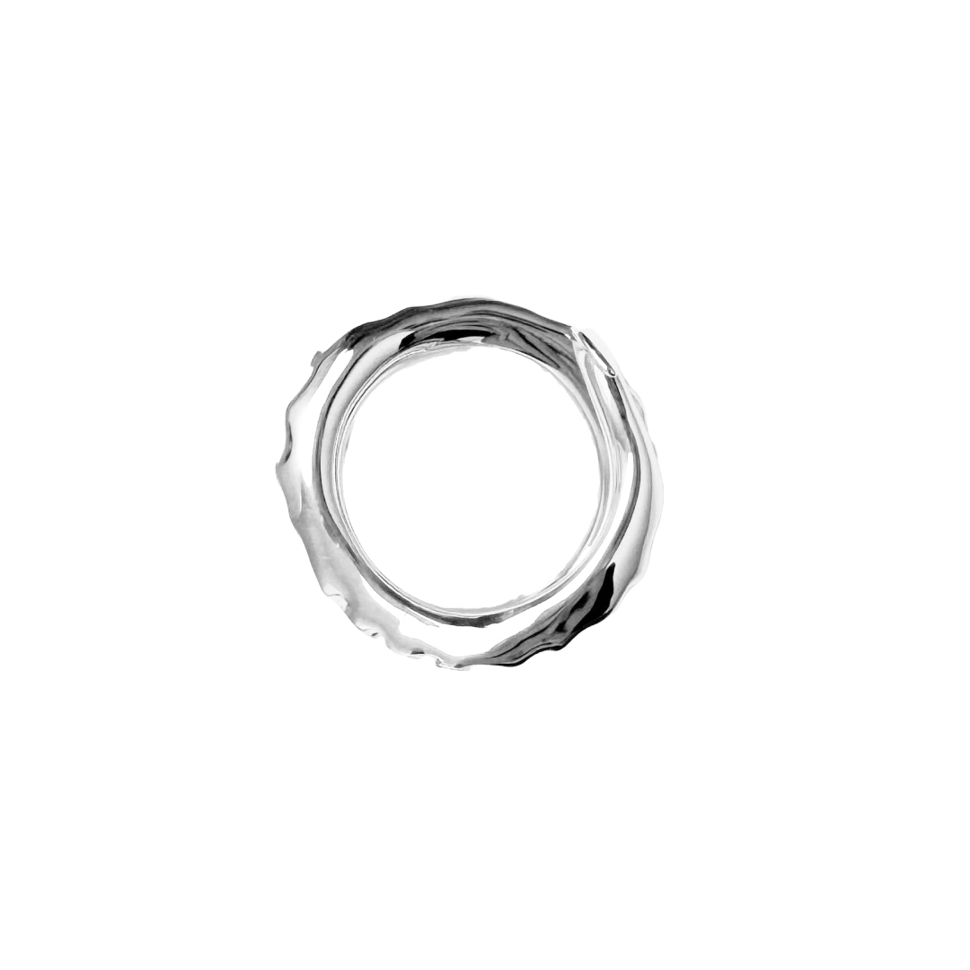 Octopus Ring — tentacle-shaped ring available in silver and black, featuring detailed suckers and a coiled design inspired by deep-sea creatures.