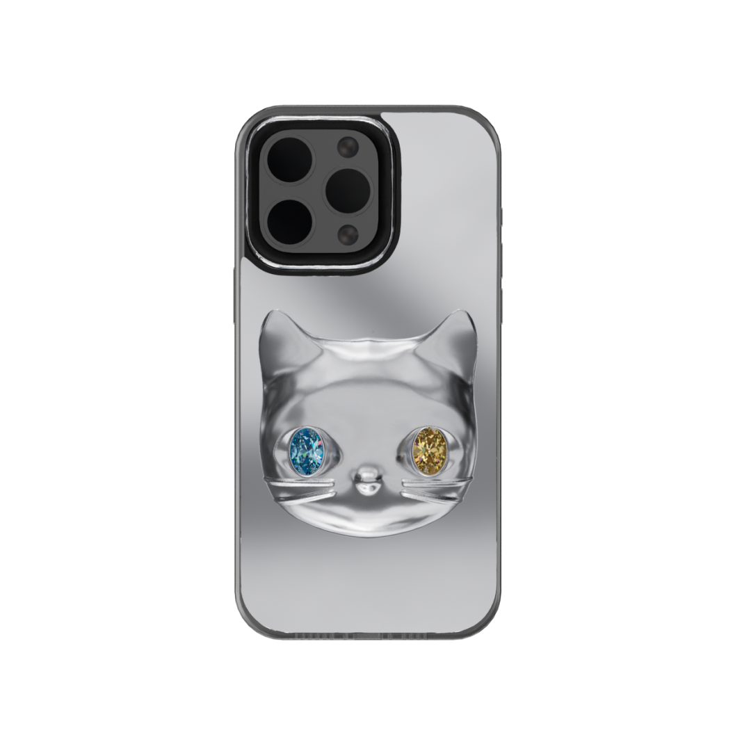 Silver mirror iPhone case with 3D cat face design, featuring mismatched gem eyes in blue and yellow — perfect for a quirky, futuristic feline aesthetic.