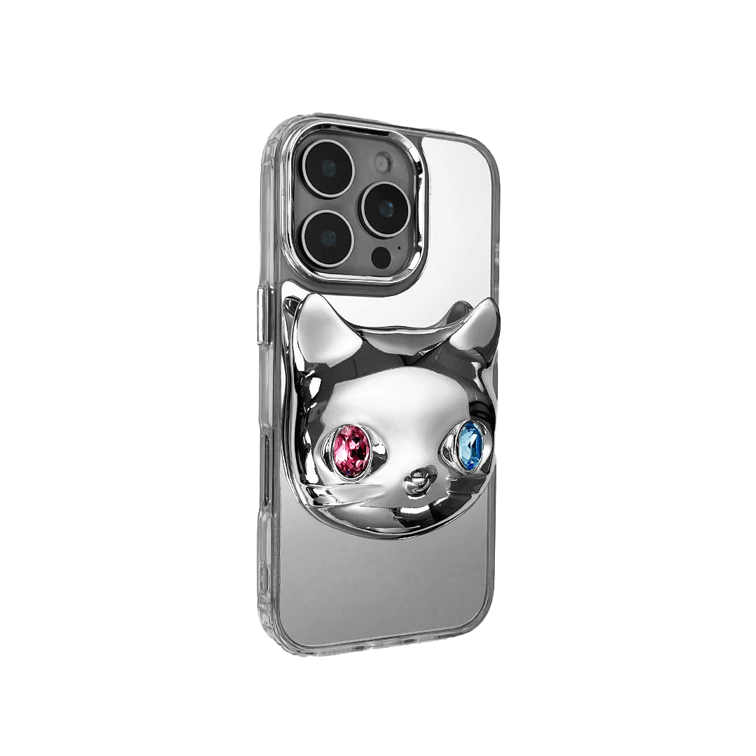 Silver mirror iPhone case with 3D cat face design, featuring mismatched gem eyes in blue and yellow — perfect for a quirky, futuristic feline aesthetic.