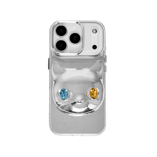 Silver mirror iPhone case with 3D cat face design, featuring mismatched gem eyes in blue and yellow — perfect for a quirky, futuristic feline aesthetic.
