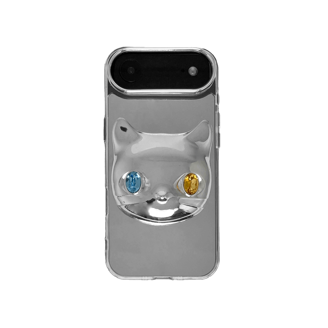 Silver mirror iPhone case with 3D cat face design, featuring mismatched gem eyes in blue and yellow — perfect for a quirky, futuristic feline aesthetic.