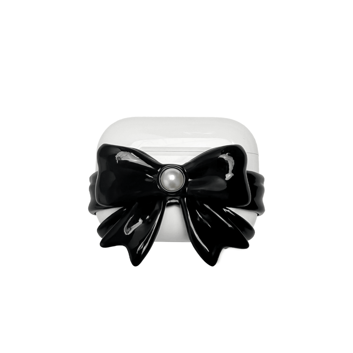 A pair of protective covers for Apple AirPods (or AirPods Pro) charging case. Each cover is white and features a large, 3D sculpted bow charm centered on the front. One bow is glossy black and the other is pure white, with a single white pearl embedded in the center of each.