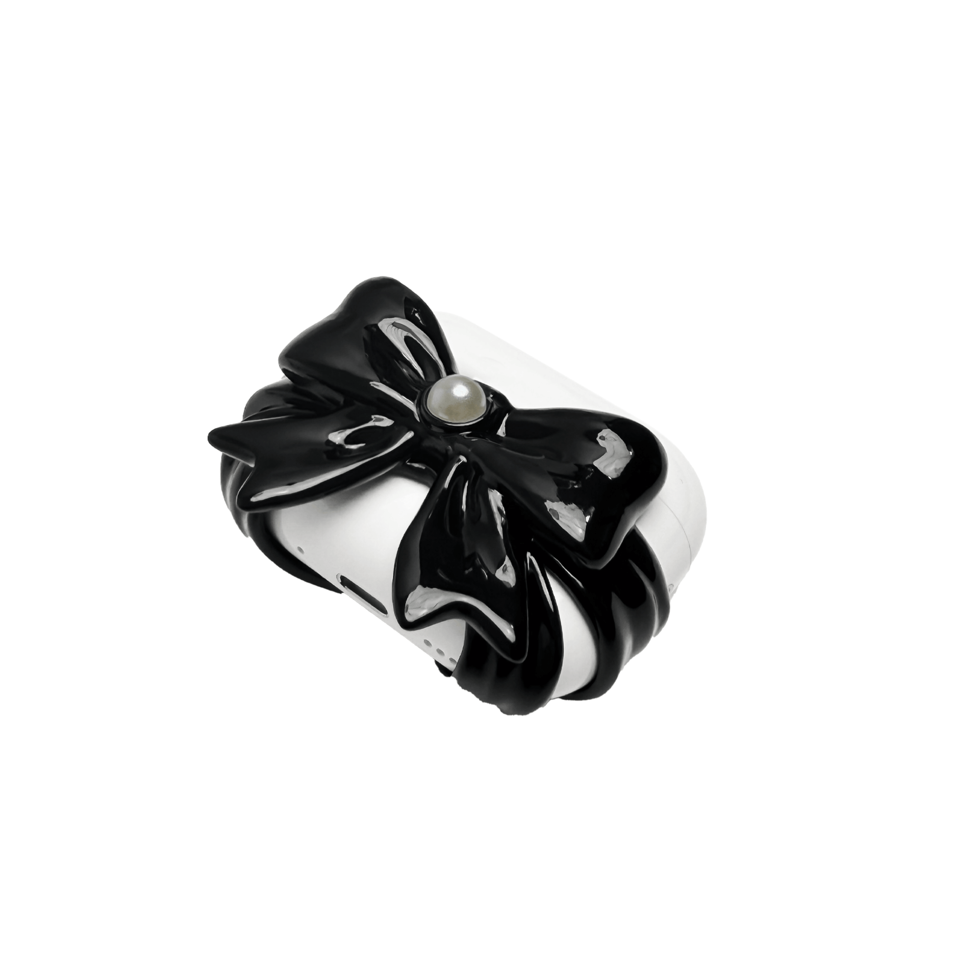 A pair of protective covers for Apple AirPods (or AirPods Pro) charging case. Each cover is white and features a large, 3D sculpted bow charm centered on the front. One bow is glossy black and the other is pure white, with a single white pearl embedded in the center of each.