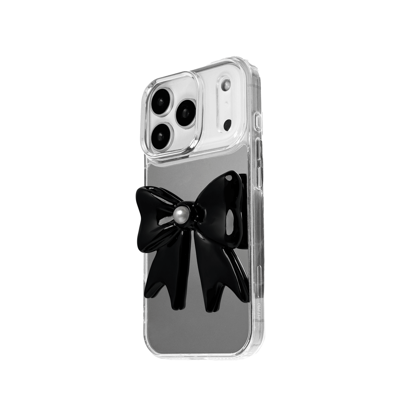 A set of two iPhone cases, both featuring a large, 3D bow charm centered on the back. One case shows a black bow and the other a white bow, with a single white pearl embedded at the center of each bow. The phone cases appear to have a silver or transparent base.