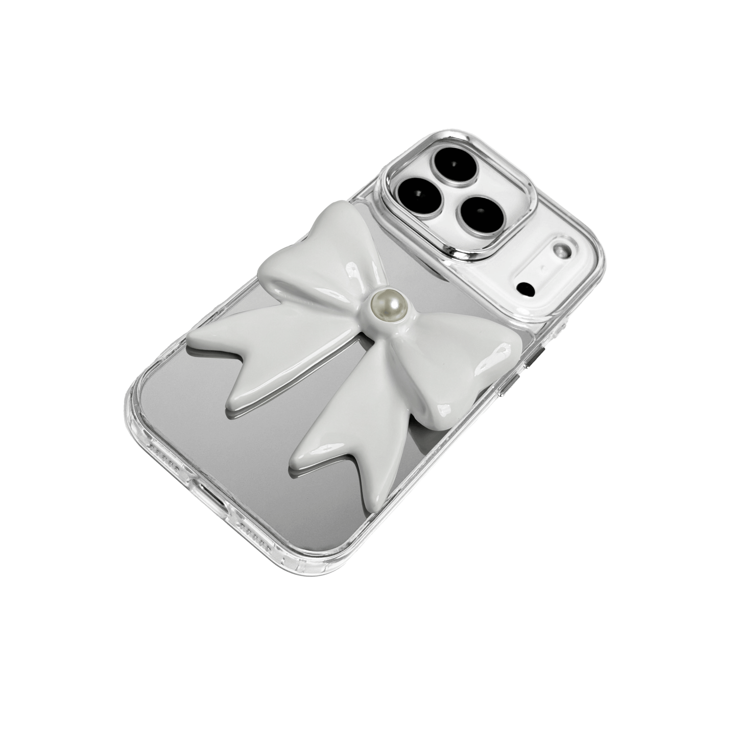 A set of two iPhone cases, both featuring a large, 3D bow charm centered on the back. One case shows a black bow and the other a white bow, with a single white pearl embedded at the center of each bow. The phone cases appear to have a silver or transparent base.