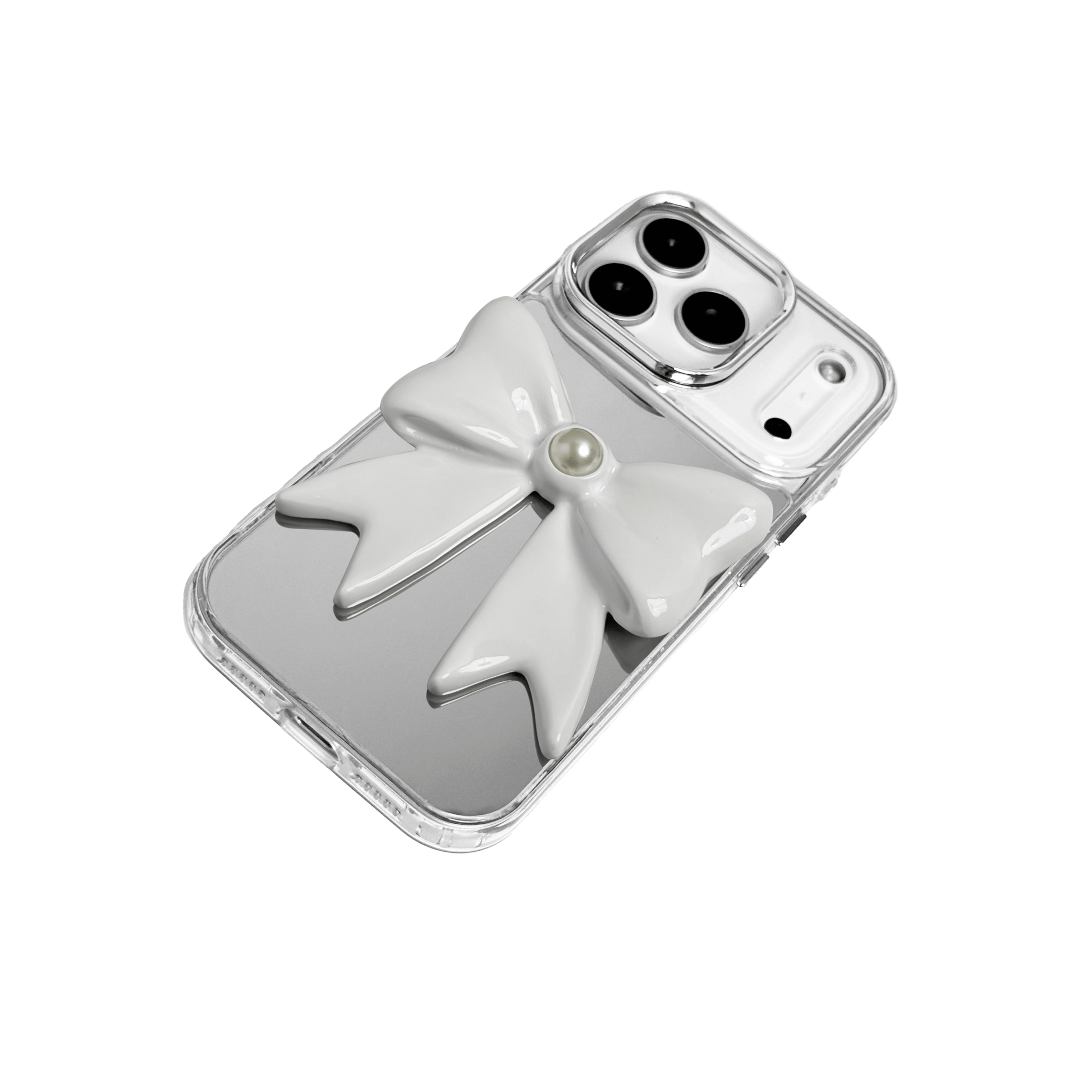 A set of two iPhone cases, both featuring a large, 3D bow charm centered on the back. One case shows a black bow and the other a white bow, with a single white pearl embedded at the center of each bow. The phone cases appear to have a silver or transparent base.