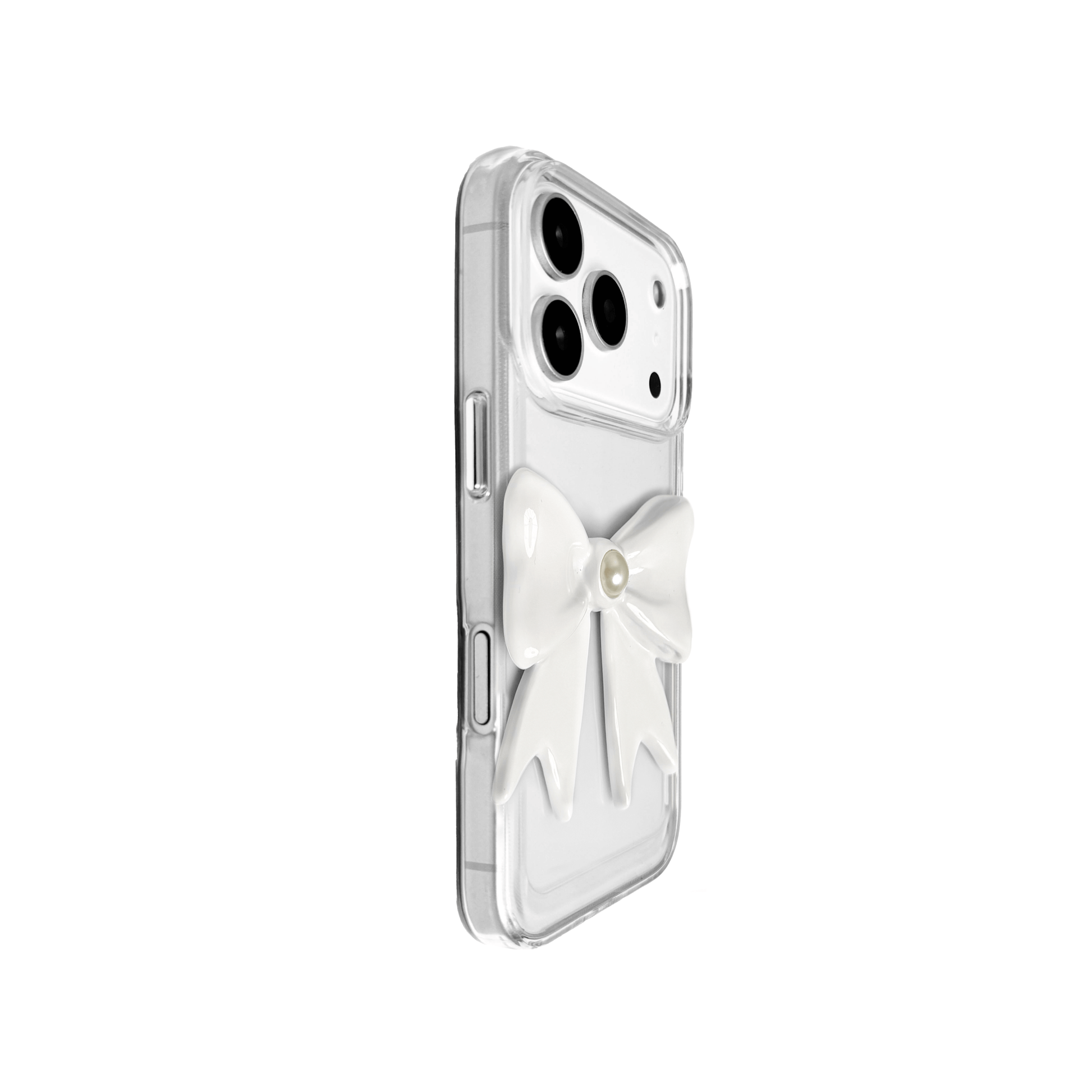 A set of two iPhone cases, both featuring a large, 3D bow charm centered on the back. One case shows a black bow and the other a white bow, with a single white pearl embedded at the center of each bow. The phone cases appear to have a silver or transparent base.