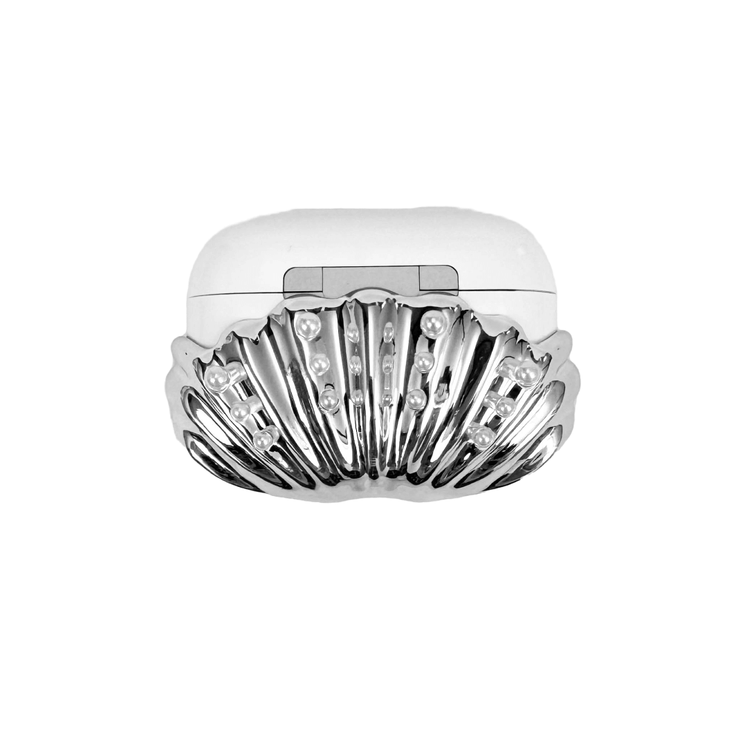 Shell-shaped headphone accessory with flowing ridges and embedded pearl-like orbs, designed to wrap around the device in a soft, ocean-inspired form.
