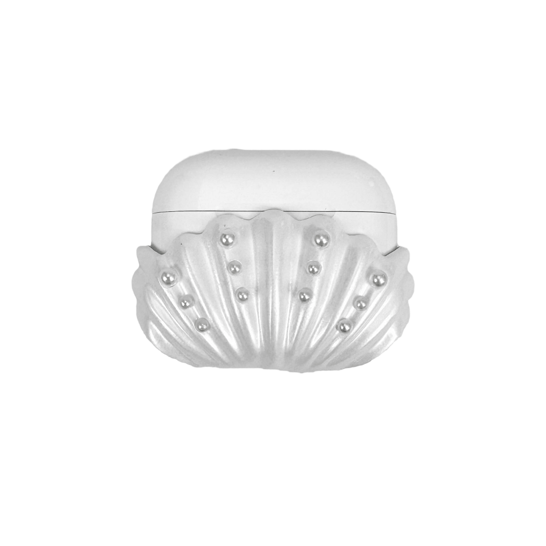 Shell-shaped headphone accessory with flowing ridges and embedded pearl-like orbs, designed to wrap around the device in a soft, ocean-inspired form.