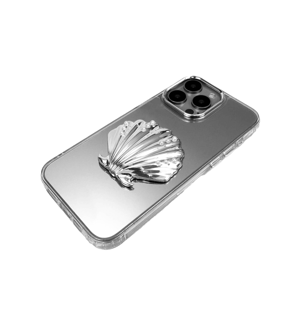 Matte phone case with a raised scallop shell design adorned with small pearl-like dots.