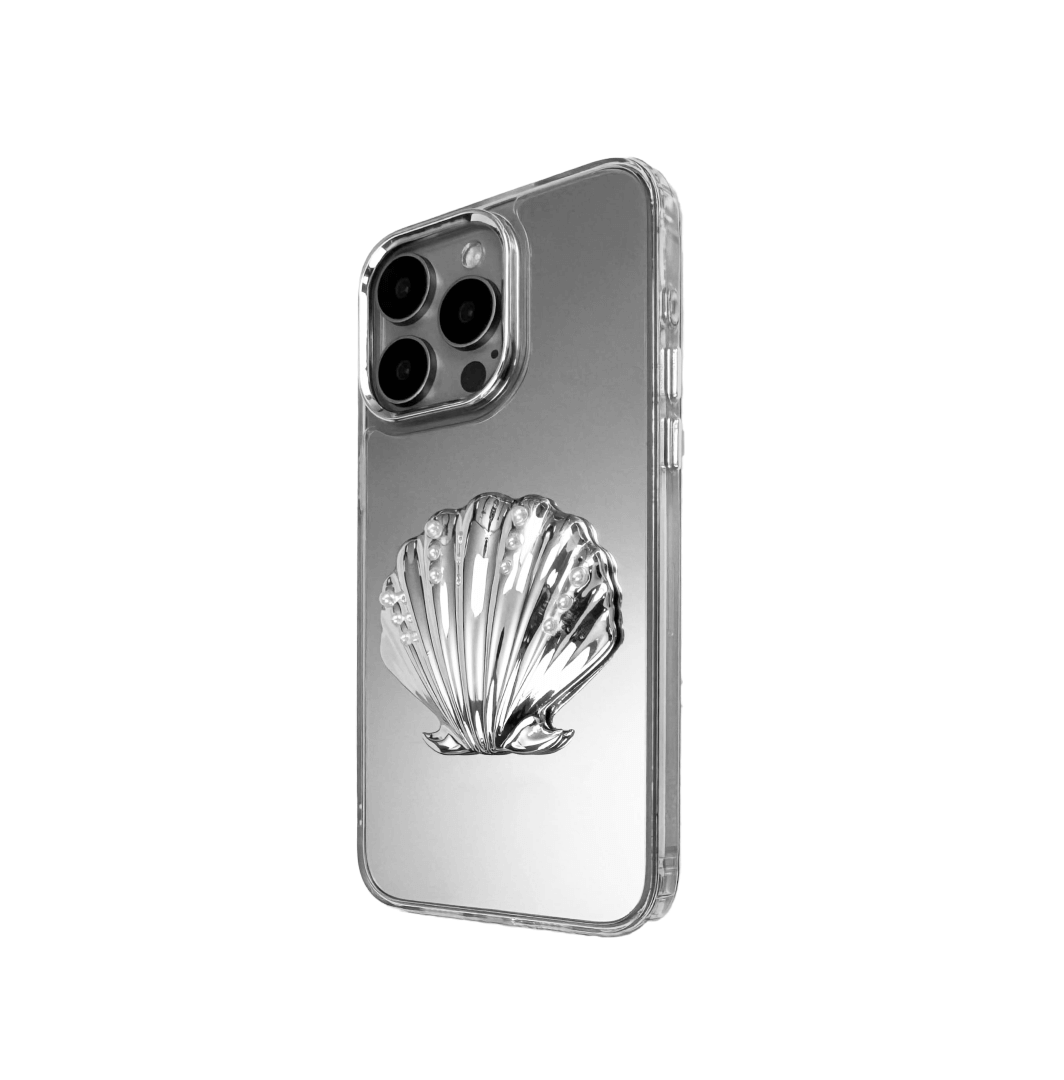 Matte phone case with a raised scallop shell design adorned with small pearl-like dots.