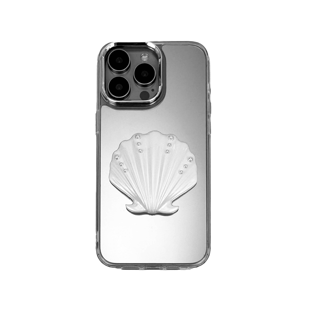 Matte phone case with a raised scallop shell design adorned with small pearl-like dots.