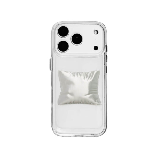 Two Pillow iPhone Cases: one with a transparent case and one with a white lychee leather case. Both feature the 3D sculpted silver/white pillow detail.