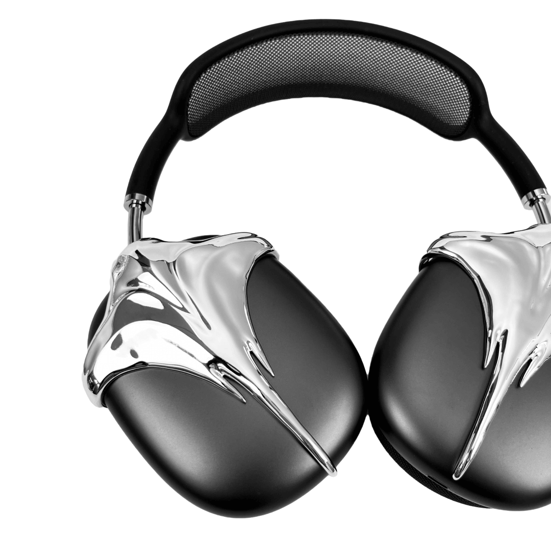 Futuristic headphones featuring a sculpted metallic stingray design with flowing, aerodynamic wings and a sharp central tail motif.