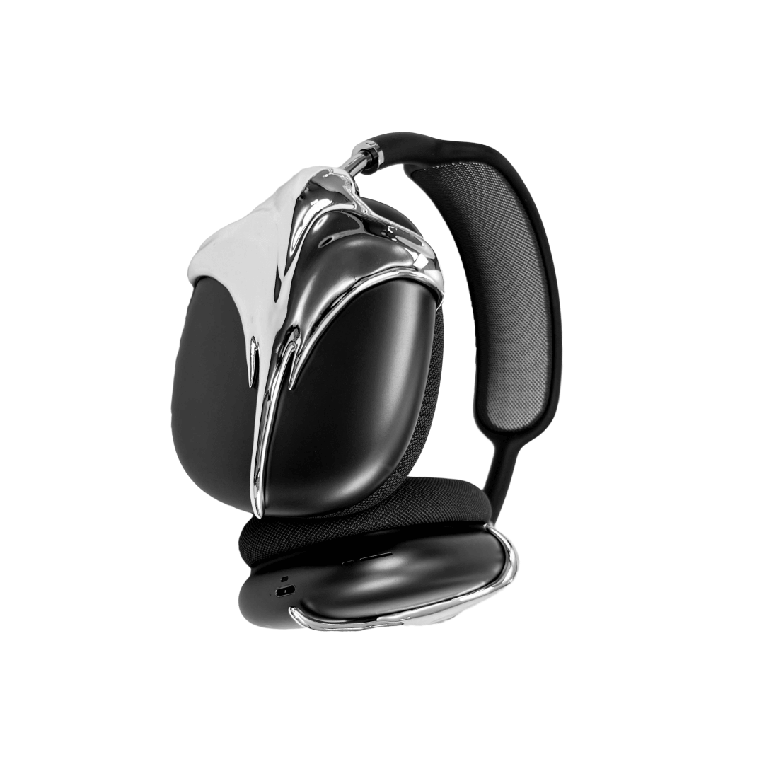 Futuristic headphones featuring a sculpted metallic stingray design with flowing, aerodynamic wings and a sharp central tail motif.