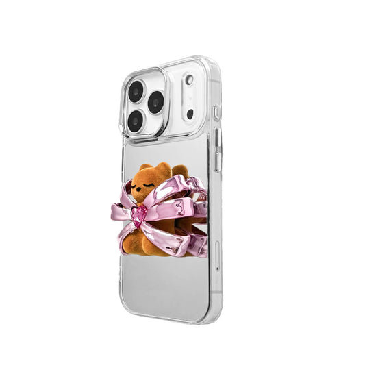 Ribbon Magic Bear iPhone Case – Pink Edition featuring a beige gummy bear holding a pink crystal heart, framed by shimmering metallic pink ribbons.