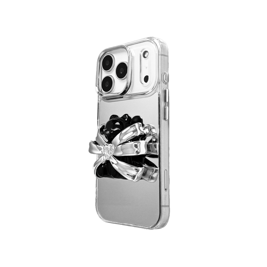 Ribbon Magic Bear iPhone Case featuring a black gummy bear holding a clear crystal heart, framed by metallic silver ribbon accents.