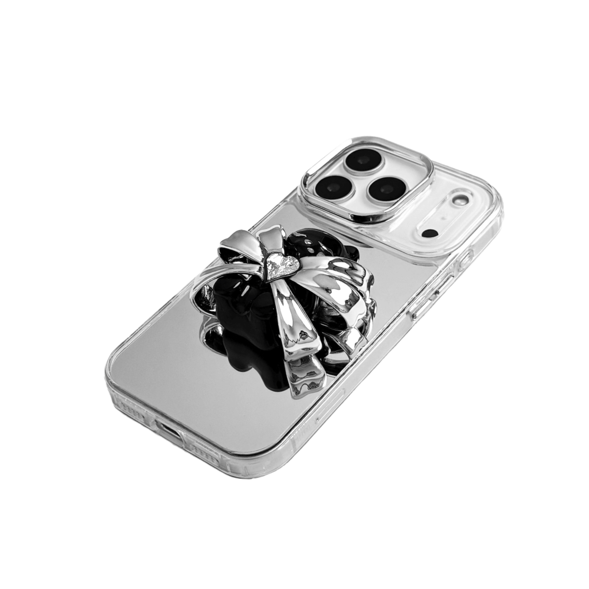 Ribbon Magic Bear iPhone Case featuring a black gummy bear holding a clear crystal heart, framed by metallic silver ribbon accents.