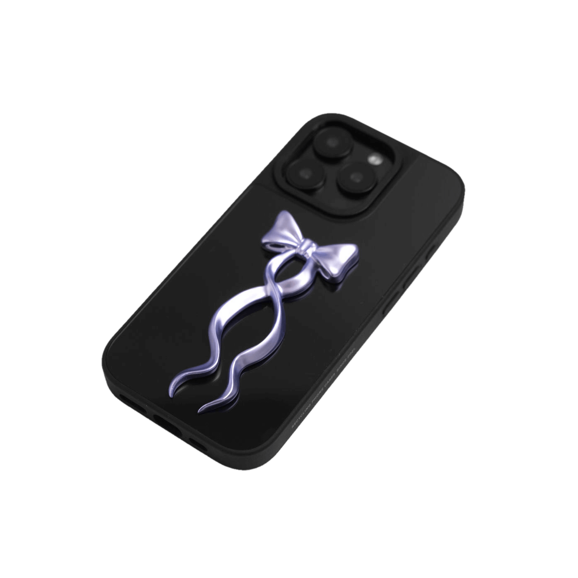 A collection of five clear or silver-based iPhone cases, each featuring a large, centered illustration of a long, stylized ribbon bow. The bows come in five colors: silver, glossy black, white, pink, and purple.