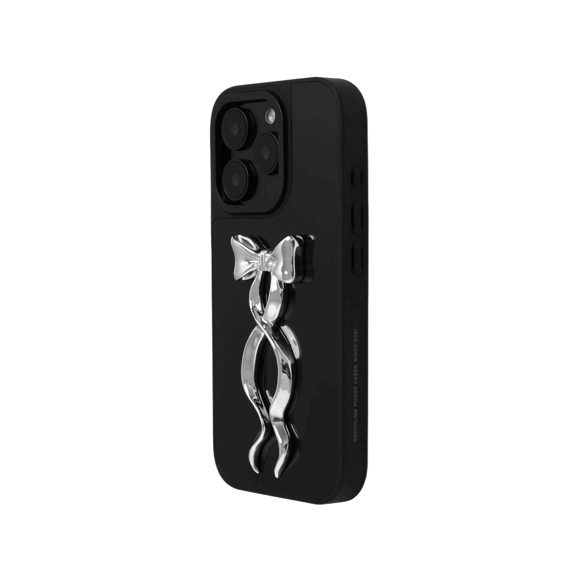 A collection of five clear or silver-based iPhone cases, each featuring a large, centered illustration of a long, stylized ribbon bow. The bows come in five colors: silver, glossy black, white, pink, and purple.