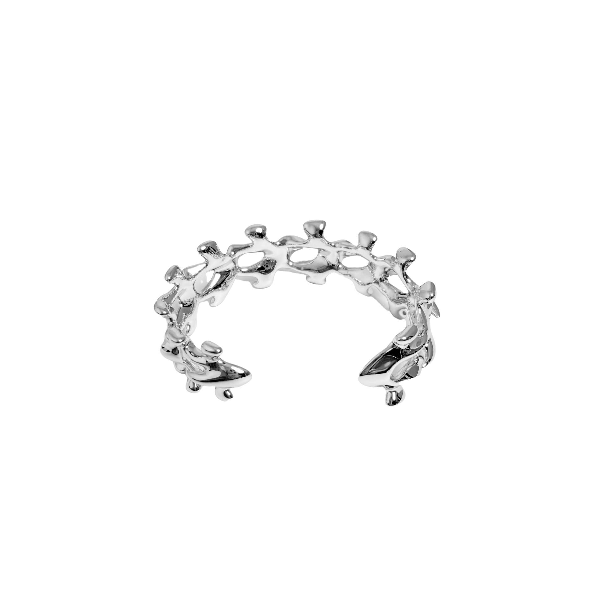 Unleash luxury elegance with the Spine Bone Bracelet. Skeletal-inspired design and oxidized finish for gothic sophistication. Perfect for unisex layering.