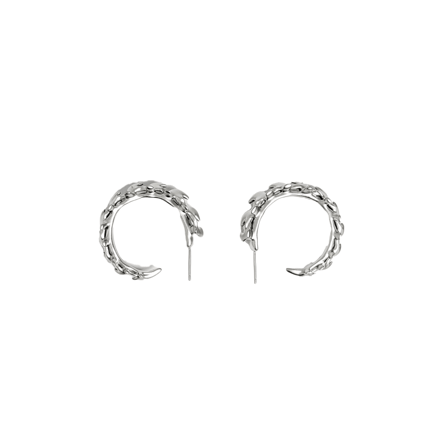 Wrap your ears in anatomical art with this luxury Spine Hoop Earrings M. Vertebra-inspired hoops for edgy stacking.