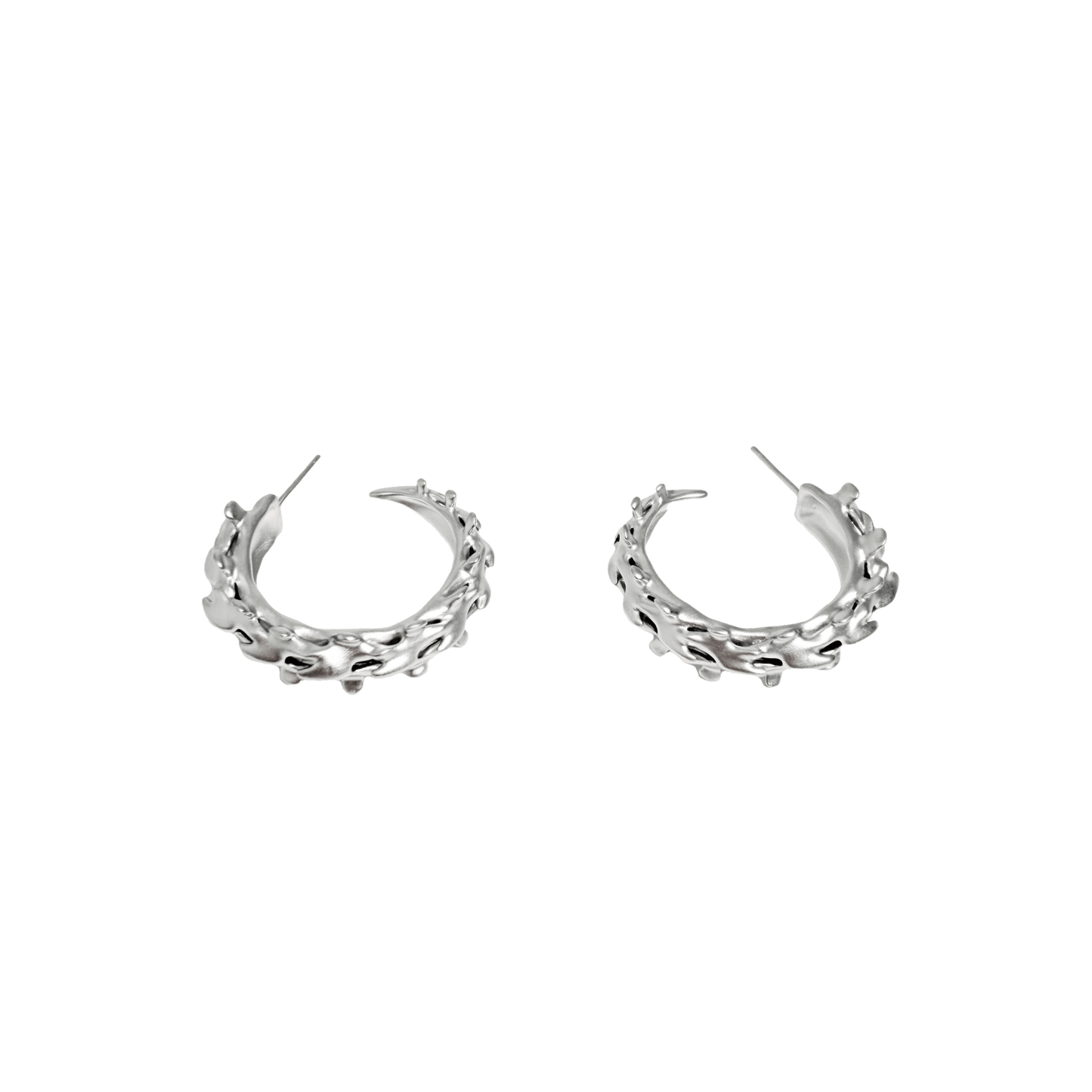 Wrap your ears in anatomical art with this luxury Spine Hoop Earrings M. Vertebra-inspired hoops for edgy stacking.