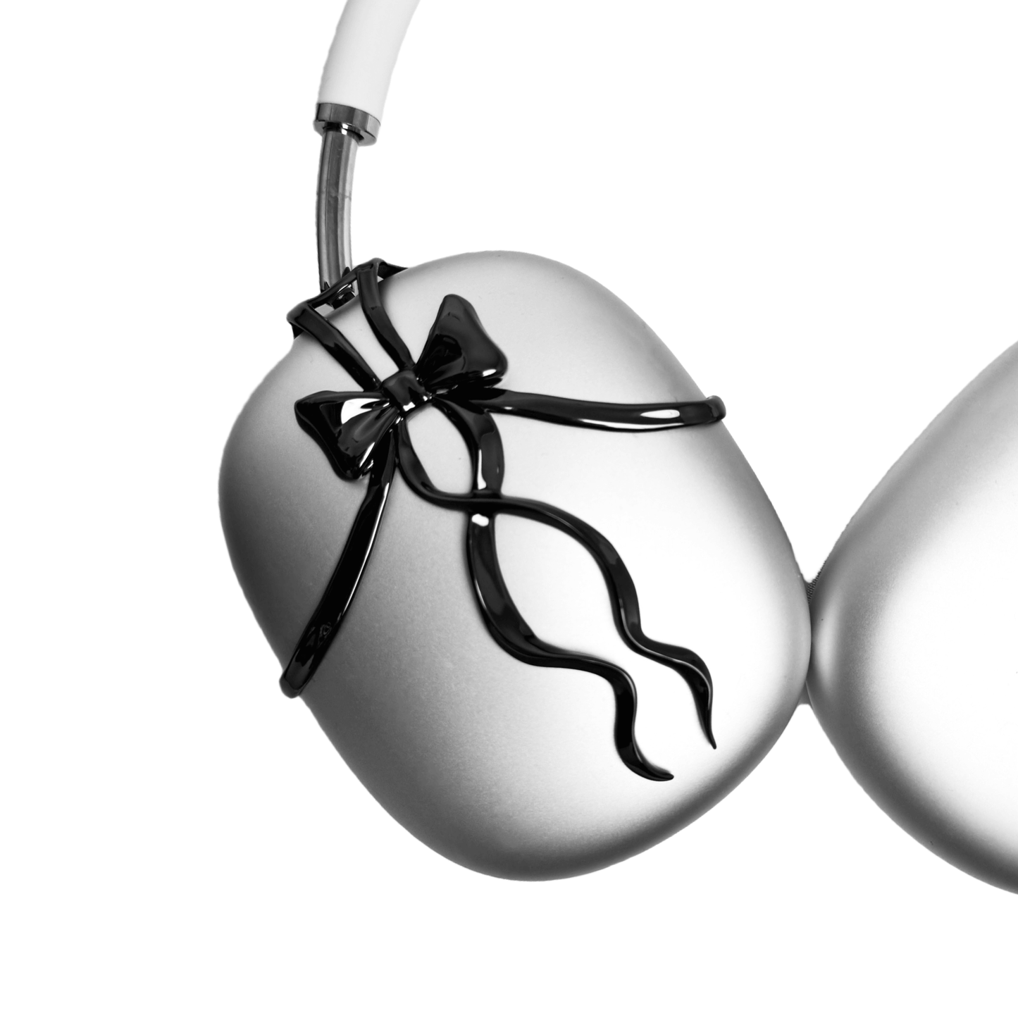 AirPods Max cover with high-polished metallic black/silver shells, featuring a flowing, monochromatic 3D ribbon design for a sophisticated, high-fashion aesthetic.