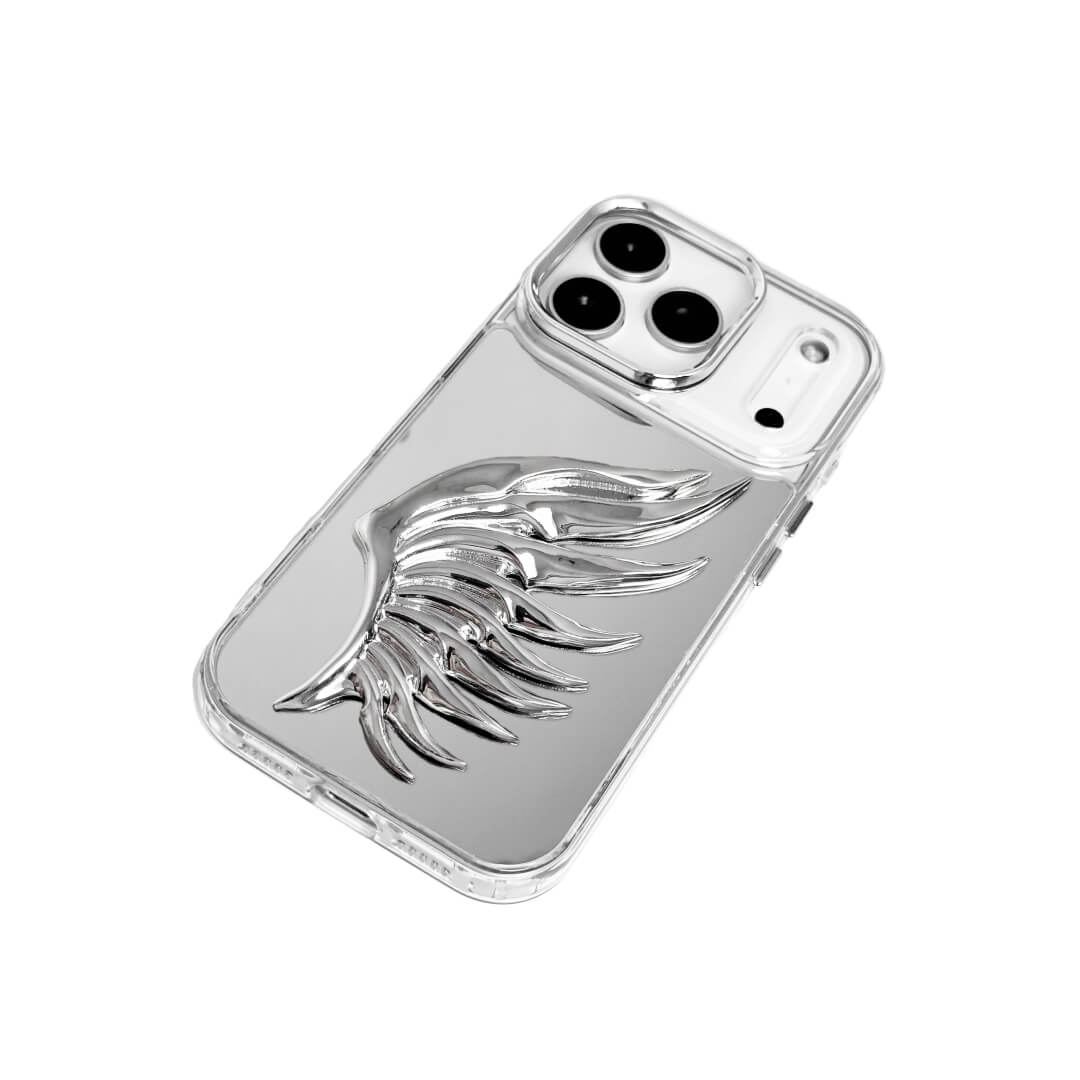 The Sculpted Silver Feather iPhone Case featuring a single 3D metallic feather with an intricate texture and high-shine chrome finish. Shown in three base variations: Silver, Transparent, and Black.