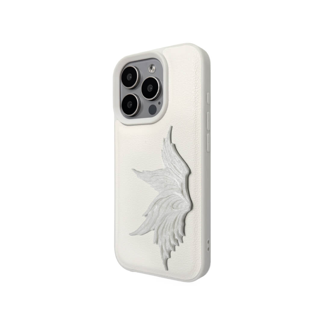 The Sculpted Single Wing iPhone Case featuring a dynamic 3D sculpted wing on one side, shown on both the Crystal Clear (Transparent) and White Leather Texture base options.