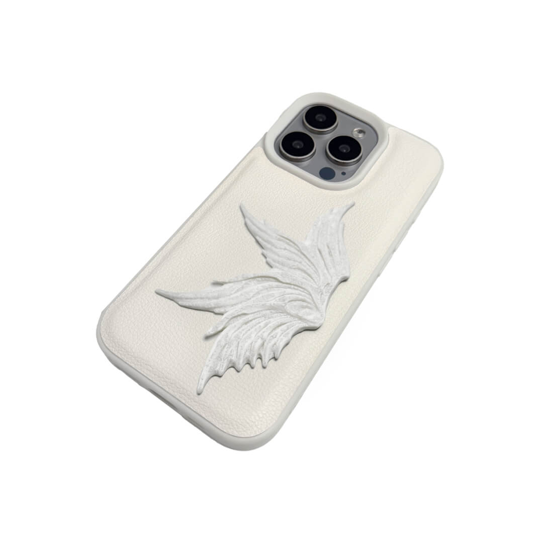 The Sculpted Single Wing iPhone Case featuring a dynamic 3D sculpted wing on one side, shown on both the Crystal Clear (Transparent) and White Leather Texture base options.