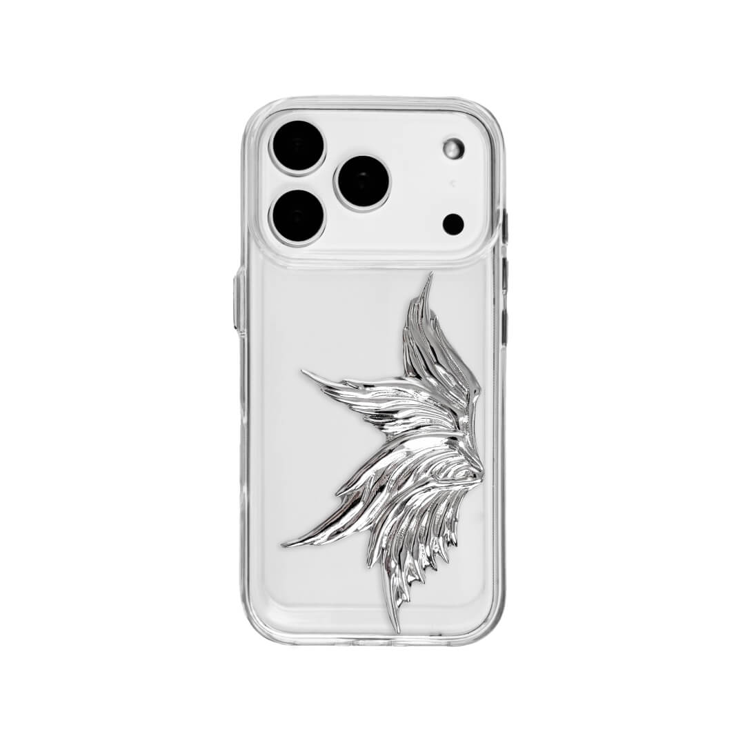 The Single Silver Angel Wing iPhone Case featuring a 3D sculpted silver metallic wing positioned on one side with an intricate feathered texture and high-shine chrome finish. Shown in three base variations: Silver, Transparent, and Black.