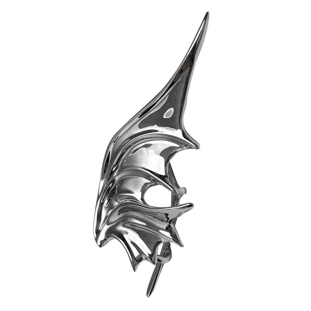 Metallic fish-shaped object on a white background