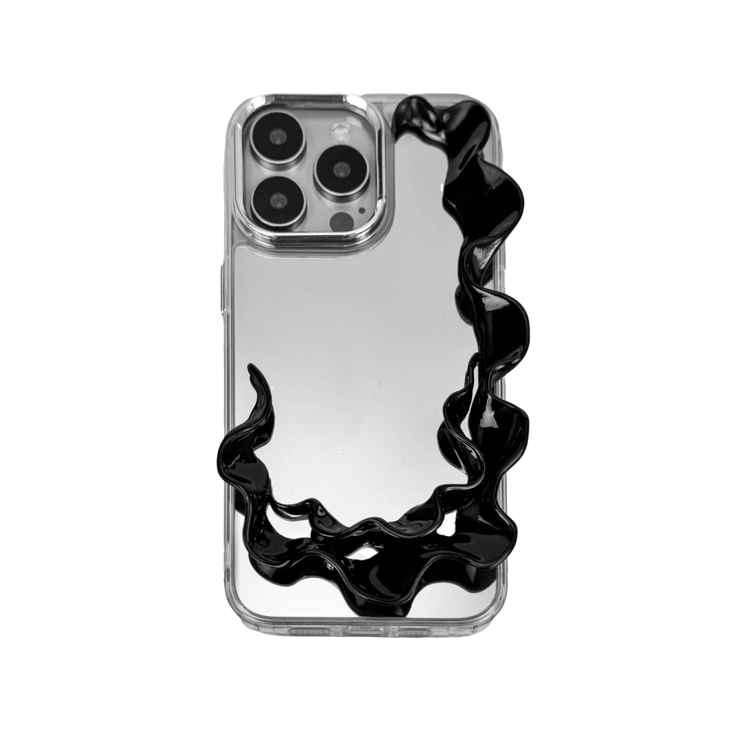 Tide Frame brings the ebb and flow of the ocean to your fingertips. This frame-style accessory encases the iPhone in a smooth, undulating silhouette, echoing the motion of water caught mid-surge. Its dark chrome finish reflects like moonlight on wet sand — a boundary that moves with the tide.

Not just a case, but a sculptural halo for your device. Every edge is alive with rhythm, every ripple a silent wave. Where protection meets poetry, Tide Frame is an elemental invitation to touch, to move, to drift.