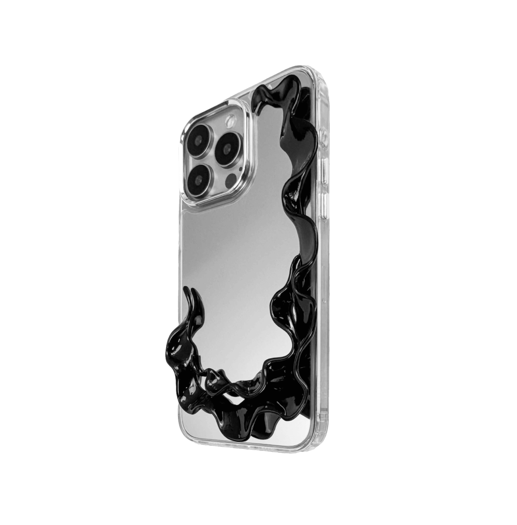 Tide Frame brings the ebb and flow of the ocean to your fingertips. This frame-style accessory encases the iPhone in a smooth, undulating silhouette, echoing the motion of water caught mid-surge. Its dark chrome finish reflects like moonlight on wet sand — a boundary that moves with the tide.

Not just a case, but a sculptural halo for your device. Every edge is alive with rhythm, every ripple a silent wave. Where protection meets poetry, Tide Frame is an elemental invitation to touch, to move, to drift.