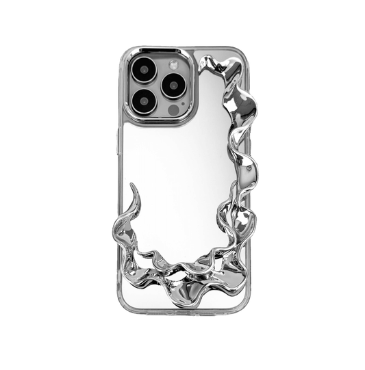 Tide Frame brings the ebb and flow of the ocean to your fingertips. This frame-style accessory encases the iPhone in a smooth, undulating silhouette, echoing the motion of water caught mid-surge. Its dark chrome finish reflects like moonlight on wet sand — a boundary that moves with the tide.

Not just a case, but a sculptural halo for your device. Every edge is alive with rhythm, every ripple a silent wave. Where protection meets poetry, Tide Frame is an elemental invitation to touch, to move, to drift.