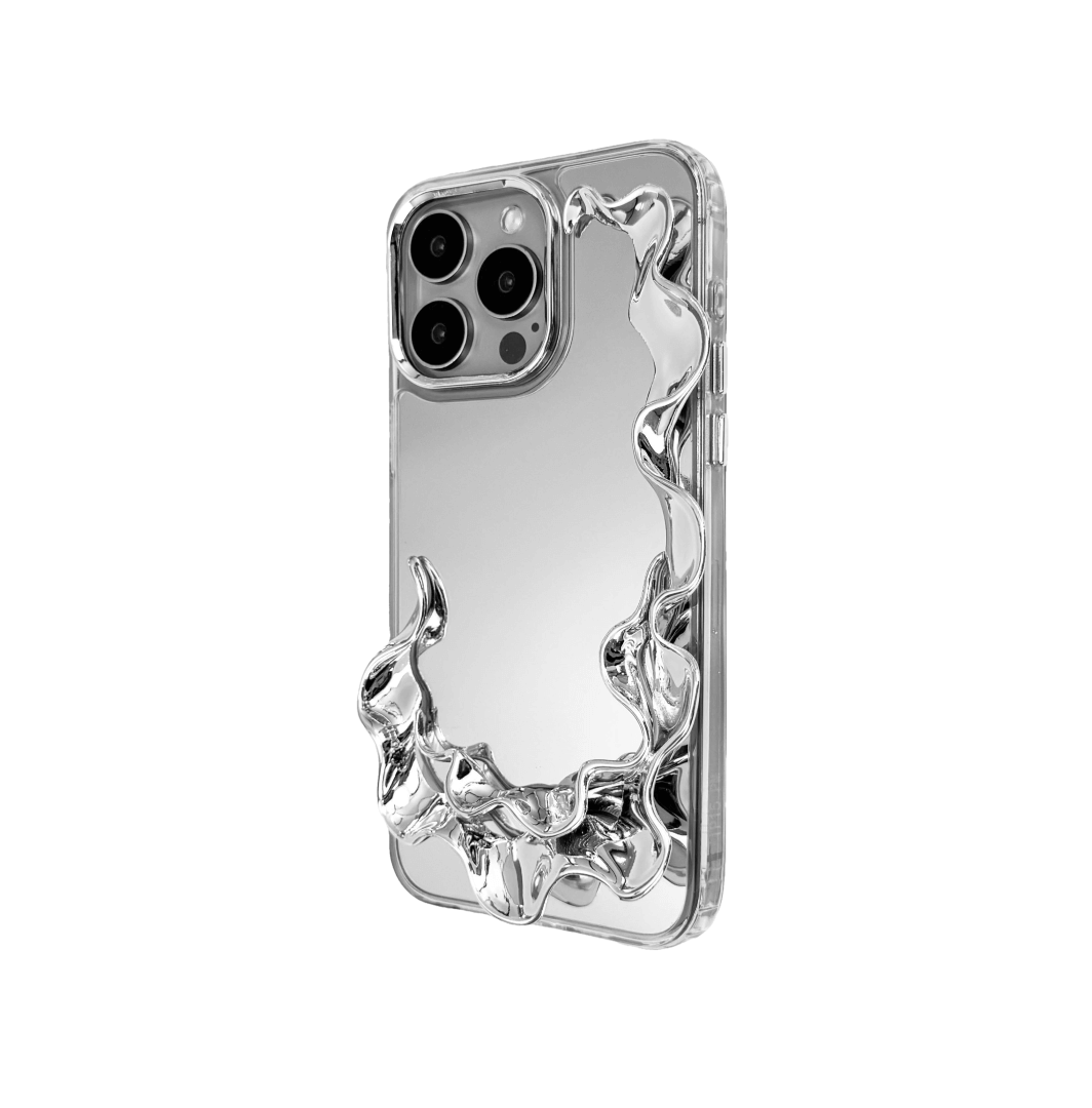 Tide Frame brings the ebb and flow of the ocean to your fingertips. This frame-style accessory encases the iPhone in a smooth, undulating silhouette, echoing the motion of water caught mid-surge. Its dark chrome finish reflects like moonlight on wet sand — a boundary that moves with the tide.

Not just a case, but a sculptural halo for your device. Every edge is alive with rhythm, every ripple a silent wave. Where protection meets poetry, Tide Frame is an elemental invitation to touch, to move, to drift.