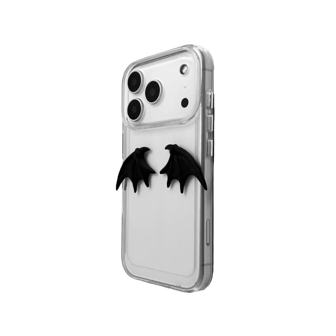A minimalist iPhone case featuring a pair of miniature 3D-printed demon wings in a natural matte black finish. Available in two variations: a Clear Transparent base for a floating effect, and a Black Leather textured base for a rich, monochromatic Gothic aesthetic.