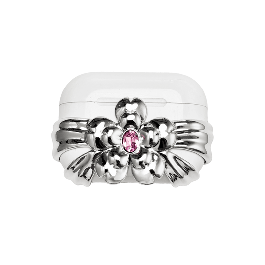 AirPods case cover with a multi-petal cherry blossom design in pink or silver, featuring a sparkling pink Swarovski crystal at the flower’s center for a refined, elegant touch.