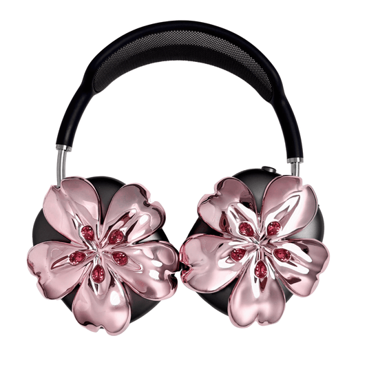 Pink cherry blossom-shaped AirPods Max covers accented with sparkling crystal embellishments, adding a luxurious floral design.