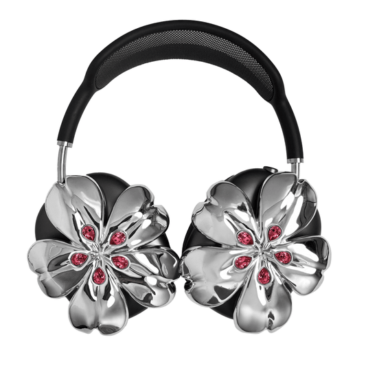 Pink cherry blossom-shaped AirPods Max covers accented with sparkling crystal embellishments, adding a luxurious floral design.