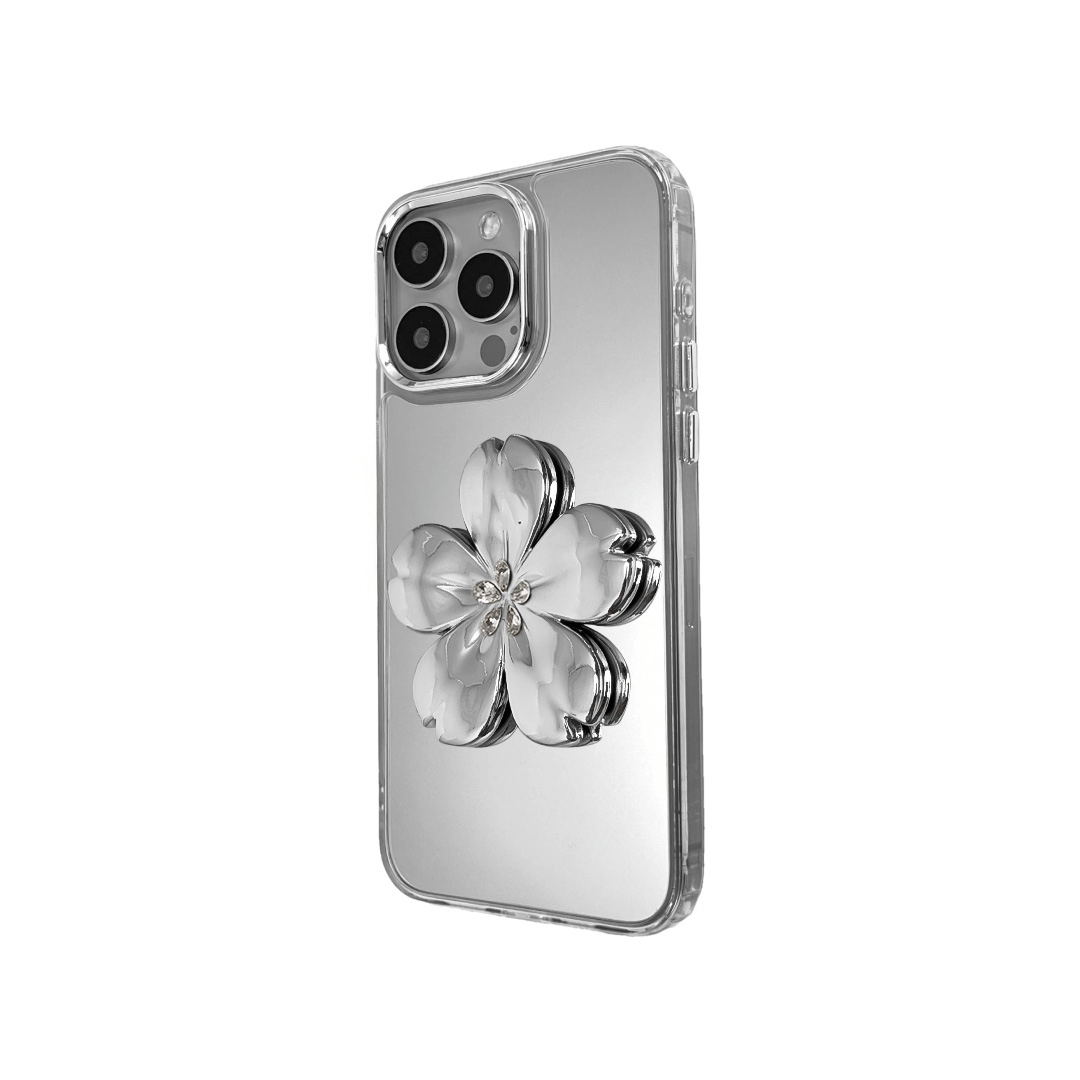 Silver mirror-finish iPhone case decorated with a cherry blossom flower in pink and silver tones, accented by five sparkling crystals for an elegant, luxurious look.