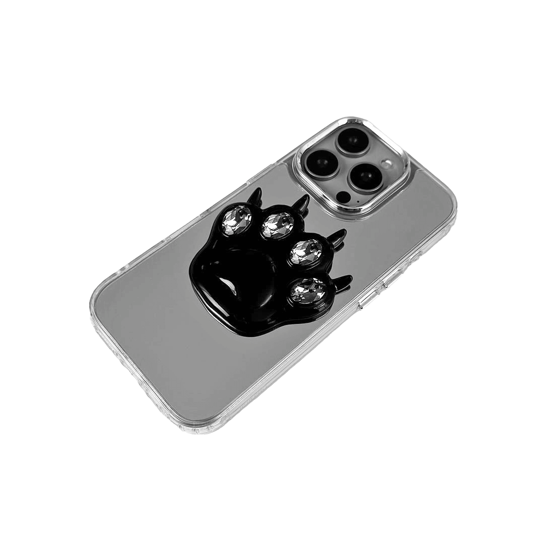 GEM CAT PAW iPhone Case with a black or silver sculpted cat paw design, set with Swarovski crystals in black, white, or pink, shown with pink crystals on a mirror-finish 
