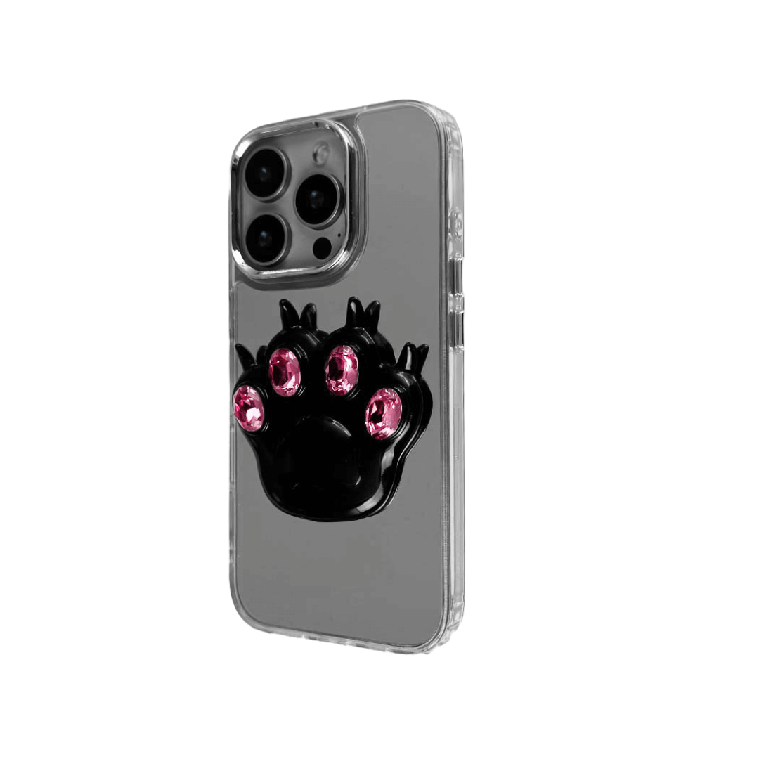 GEM CAT PAW iPhone Case with a black or silver sculpted cat paw design, set with Swarovski crystals in black, white, or pink, shown with pink crystals on a mirror-finish 