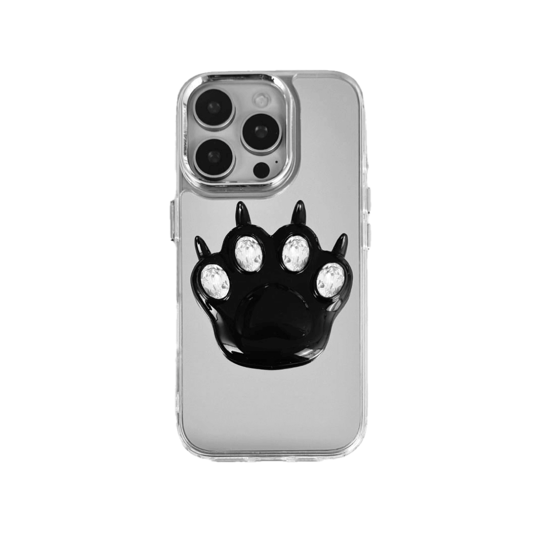 GEM CAT PAW iPhone Case with a black or silver sculpted cat paw design, set with Swarovski crystals in black, white, or pink, shown with pink crystals on a mirror-finish 