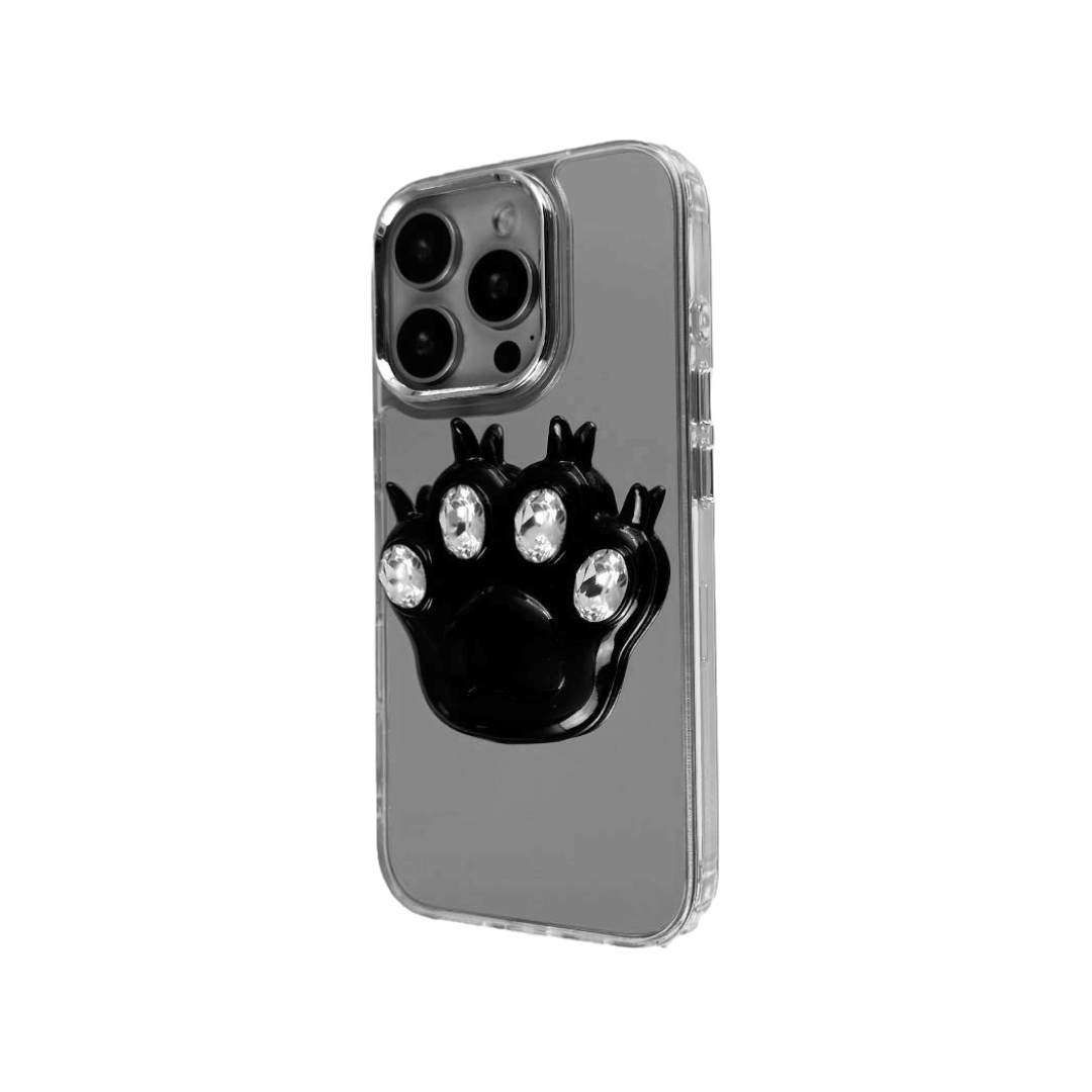 GEM CAT PAW iPhone Case with a black or silver sculpted cat paw design, set with Swarovski crystals in black, white, or pink, shown with pink crystals on a mirror-finish 