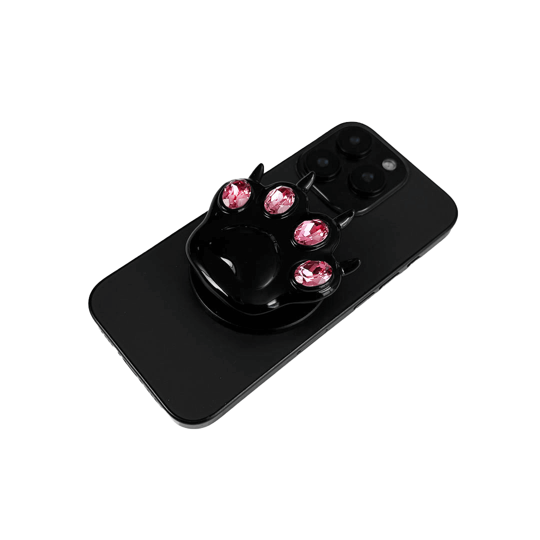 GEM CAT PAW phone grip with black or silver cat paw design, adorned with Swarovski crystals in black, white, or pink.