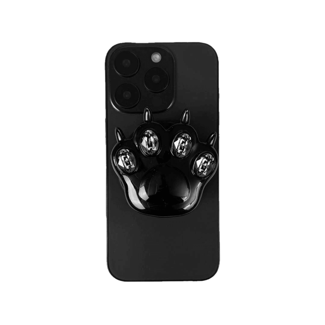 GEM CAT PAW phone grip with black or silver cat paw design, adorned with Swarovski crystals in black, white, or pink.