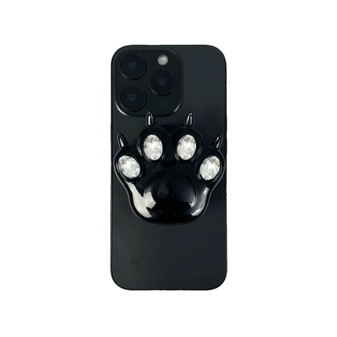 GEM CAT PAW phone grip with black or silver cat paw design, adorned with Swarovski crystals in black, white, or pink.