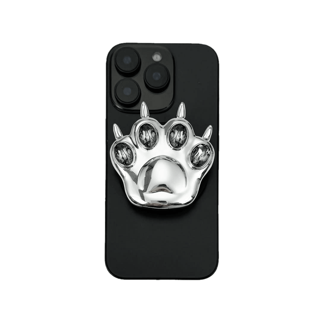 GEM CAT PAW phone grip with black or silver cat paw design, adorned with Swarovski crystals in black, white, or pink.